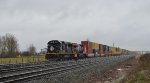 Fresh crew change in Fisher Siding, with conductor of IC 1011 taking a moment to take a pic of the unit stack train to be E/B to Chicago from Robert's Bank.